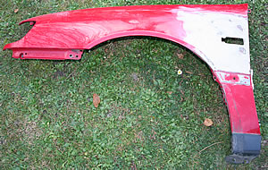 gebrauchter Kotfluegel f�r Nissan P10