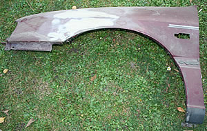 gebrauchter Kotfluegel f�r Nissan P10